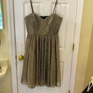 Dress The Population! Adjustable straps! Metallic gold and black.